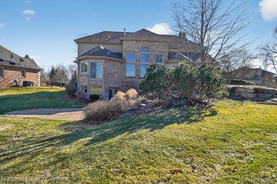 Welcome to this stunning, renovated golf course estate located on Prestwick Village Golf Club in Michigan - for sale on GolfHomes.com, golf home, golf lot