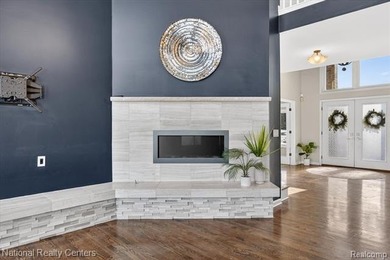 Welcome to this stunning, renovated golf course estate located on Prestwick Village Golf Club in Michigan - for sale on GolfHomes.com, golf home, golf lot