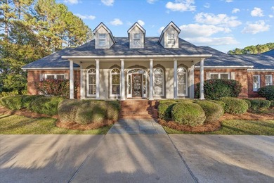 Set on a secluded street directly across from the Robert Trent on Highland Oaks Golf Course in Alabama - for sale on GolfHomes.com, golf home, golf lot