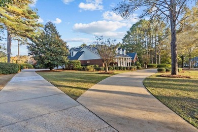 Set on a secluded street directly across from the Robert Trent on Highland Oaks Golf Course in Alabama - for sale on GolfHomes.com, golf home, golf lot