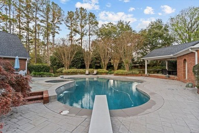 Set on a secluded street directly across from the Robert Trent on Highland Oaks Golf Course in Alabama - for sale on GolfHomes.com, golf home, golf lot
