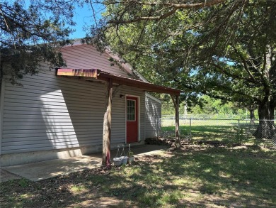 RUSTIC 1 1/2 STORY HOME NESTLED ON 3.11 ACRES IN A PARK LIKE on Pineridge Golf Course in Missouri - for sale on GolfHomes.com, golf home, golf lot