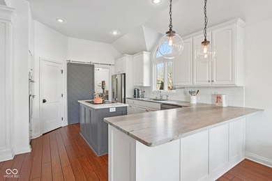 Welcome to your dream home in the heart of Fishers, nestled on River Glen Country Club in Indiana - for sale on GolfHomes.com, golf home, golf lot