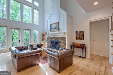 Nestled in the coveted Waterfall at Lake Burton community, this on Waterfall Country Club in Georgia - for sale on GolfHomes.com, golf home, golf lot