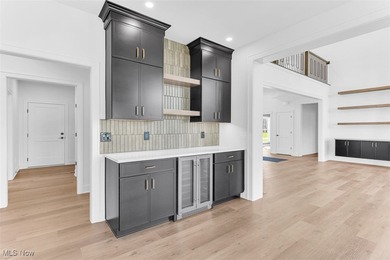 Simcon Homes delivers a show-stopping new spec home that on Barrington Golf Club in Ohio - for sale on GolfHomes.com, golf home, golf lot