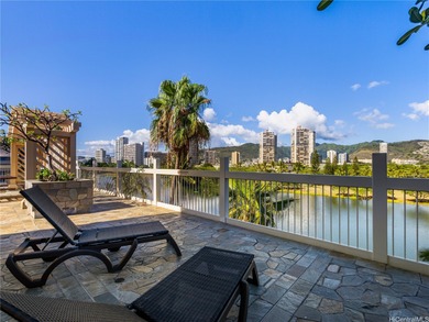 Live where the world vacations at Island Colony in the heart of on Ala Wai Golf Course in Hawaii - for sale on GolfHomes.com, golf home, golf lot