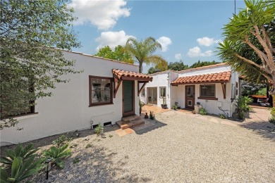 Welcome to 440 W San Antonio Drive, a timeless Spanish-style gem on Virginia Country Club in California - for sale on GolfHomes.com, golf home, golf lot