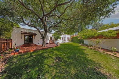 Welcome to 440 W San Antonio Drive, a timeless Spanish-style gem on Virginia Country Club in California - for sale on GolfHomes.com, golf home, golf lot