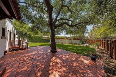 Welcome to 440 W San Antonio Drive, a timeless Spanish-style gem on Virginia Country Club in California - for sale on GolfHomes.com, golf home, golf lot