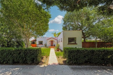 Welcome to 440 W San Antonio Drive, a timeless Spanish-style gem on Virginia Country Club in California - for sale on GolfHomes.com, golf home, golf lot