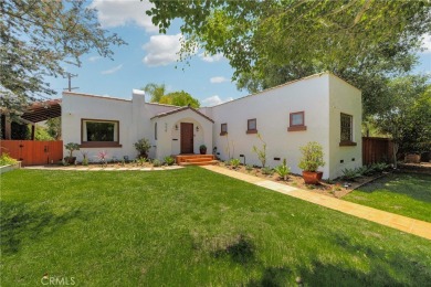 Welcome to 440 W San Antonio Drive, a timeless Spanish-style gem on Virginia Country Club in California - for sale on GolfHomes.com, golf home, golf lot