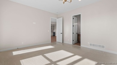 NEW BUILD, LAKE VIEWS, QUALITY CRAFTMANSHIP! Discover space on Seasons Ridge At Four Seasons in Missouri - for sale on GolfHomes.com, golf home, golf lot