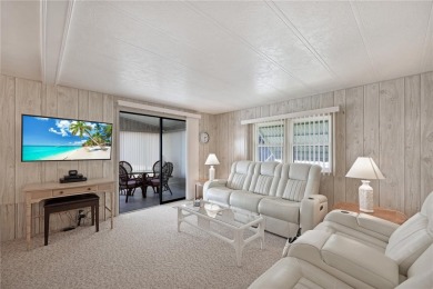 This beautifully maintained 2-bedroom, 2-bath home is located in on Maple Leaf Golf and Country Club in Florida - for sale on GolfHomes.com, golf home, golf lot