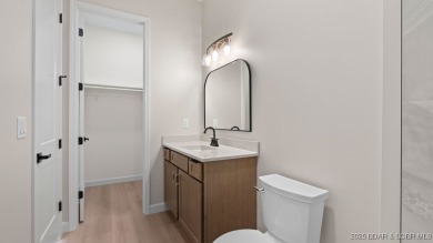 NEW BUILD, LAKE VIEWS, QUALITY CRAFTMANSHIP! Discover space on Seasons Ridge At Four Seasons in Missouri - for sale on GolfHomes.com, golf home, golf lot