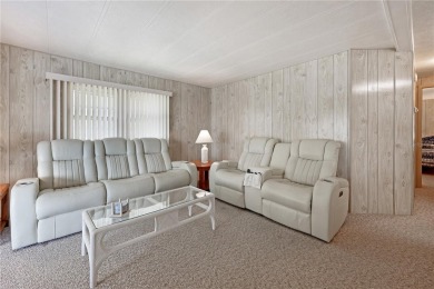 This beautifully maintained 2-bedroom, 2-bath home is located in on Maple Leaf Golf and Country Club in Florida - for sale on GolfHomes.com, golf home, golf lot