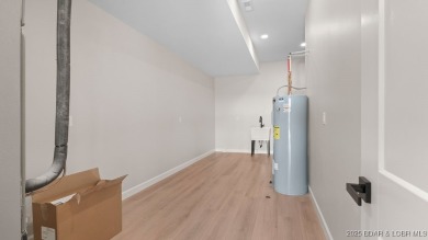 NEW BUILD, LAKE VIEWS, QUALITY CRAFTMANSHIP! Discover space on Seasons Ridge At Four Seasons in Missouri - for sale on GolfHomes.com, golf home, golf lot
