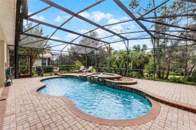 One or more photo(s) has been virtually staged. Experience on The Legacy Club At Alaqua Lakes in Florida - for sale on GolfHomes.com, golf home, golf lot