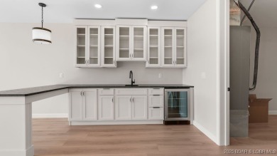 NEW BUILD, LAKE VIEWS, QUALITY CRAFTMANSHIP! Discover space on Seasons Ridge At Four Seasons in Missouri - for sale on GolfHomes.com, golf home, golf lot