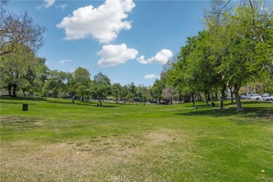 Welcome to 440 W San Antonio Drive, a timeless Spanish-style gem on Virginia Country Club in California - for sale on GolfHomes.com, golf home, golf lot