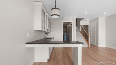 NEW BUILD, LAKE VIEWS, QUALITY CRAFTMANSHIP! Discover space on Seasons Ridge At Four Seasons in Missouri - for sale on GolfHomes.com, golf home, golf lot