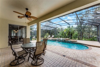 One or more photo(s) has been virtually staged. Experience on The Legacy Club At Alaqua Lakes in Florida - for sale on GolfHomes.com, golf home, golf lot