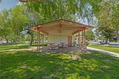 Welcome to 440 W San Antonio Drive, a timeless Spanish-style gem on Virginia Country Club in California - for sale on GolfHomes.com, golf home, golf lot