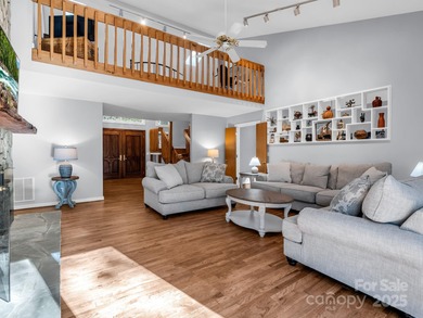 Beautiful resort home on 2.4 private wooded acres within minutes on Rumbling Bald Resort on Lake Lure in North Carolina - for sale on GolfHomes.com, golf home, golf lot