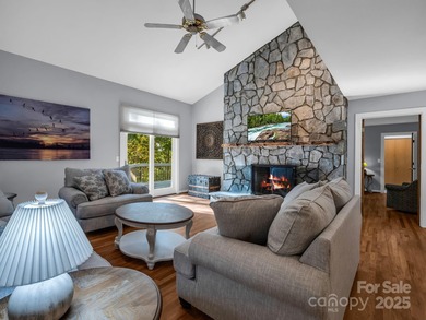 Beautiful resort home on 2.4 private wooded acres within minutes on Rumbling Bald Resort on Lake Lure in North Carolina - for sale on GolfHomes.com, golf home, golf lot