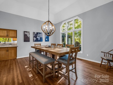 Beautiful resort home on 2.4 private wooded acres within minutes on Rumbling Bald Resort on Lake Lure in North Carolina - for sale on GolfHomes.com, golf home, golf lot