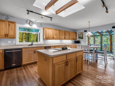 Beautiful resort home on 2.4 private wooded acres within minutes on Rumbling Bald Resort on Lake Lure in North Carolina - for sale on GolfHomes.com, golf home, golf lot