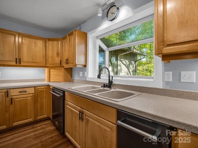 Beautiful resort home on 2.4 private wooded acres within minutes on Rumbling Bald Resort on Lake Lure in North Carolina - for sale on GolfHomes.com, golf home, golf lot