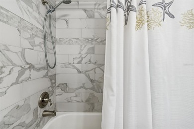 Located in East Lake Woodlands this quiet private second-story on East Lake Woodlands Country Club in Florida - for sale on GolfHomes.com, golf home, golf lot