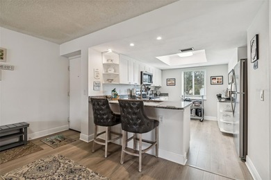 Located in East Lake Woodlands this quiet private second-story on East Lake Woodlands Country Club in Florida - for sale on GolfHomes.com, golf home, golf lot