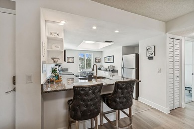 Located in East Lake Woodlands this quiet private second-story on East Lake Woodlands Country Club in Florida - for sale on GolfHomes.com, golf home, golf lot