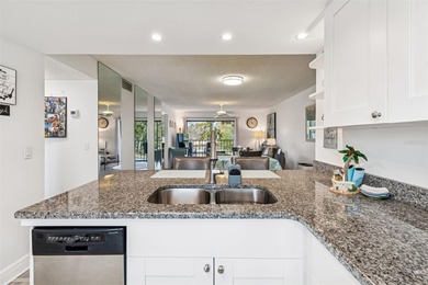 Located in East Lake Woodlands this quiet private second-story on East Lake Woodlands Country Club in Florida - for sale on GolfHomes.com, golf home, golf lot