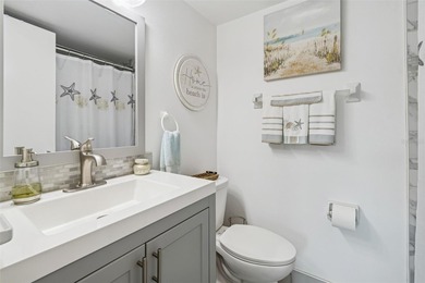 Located in East Lake Woodlands this quiet private second-story on East Lake Woodlands Country Club in Florida - for sale on GolfHomes.com, golf home, golf lot