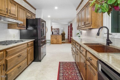 Welcome Home!
This charming ranch-style home sits on the 9th on Carolina Trace Country Club in North Carolina - for sale on GolfHomes.com, golf home, golf lot