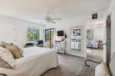 Located in East Lake Woodlands this quiet private second-story on East Lake Woodlands Country Club in Florida - for sale on GolfHomes.com, golf home, golf lot