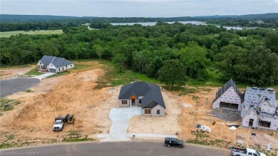 Now offering up to $7,500 in builder and preferred lender on Vache-Grasse Country Club in Arkansas - for sale on GolfHomes.com, golf home, golf lot