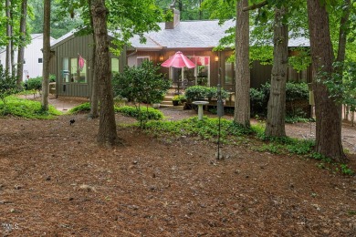 Welcome Home!
This charming ranch-style home sits on the 9th on Carolina Trace Country Club in North Carolina - for sale on GolfHomes.com, golf home, golf lot