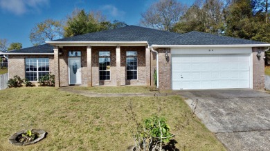 This stunning 4-bedroom, 3-bath home sits atop a hill in the on Foxwood Country Club in Florida - for sale on GolfHomes.com, golf home, golf lot
