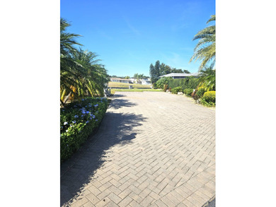 Located on the 15th fairway of the executive golf course at Deer on Deer Creek RV Golf Resort in Florida - for sale on GolfHomes.com, golf home, golf lot