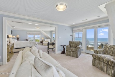 This exceptional oceanfront home in Roosevelt Beach showcases on The Country Club of the Crystal Coast in North Carolina - for sale on GolfHomes.com, golf home, golf lot