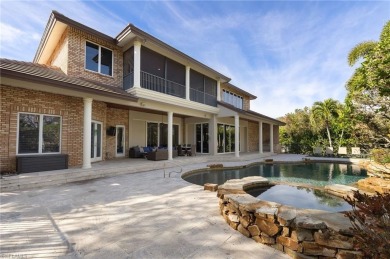 Stunning Estate Home with Lake and Golf Course Views in Quail on  in Florida - for sale on GolfHomes.com, golf home, golf lot