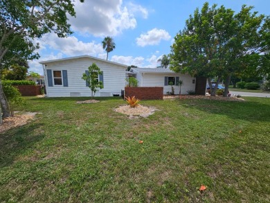 This lovely home is located in North Fort Myers Florida! Pine on Pine Lakes Country Club in Florida - for sale on GolfHomes.com, golf home, golf lot