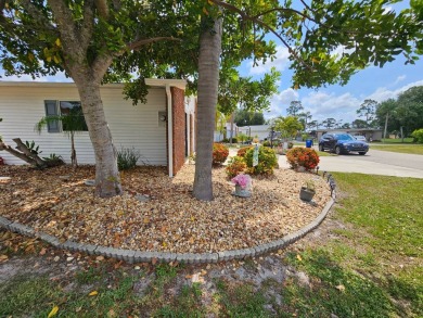 This lovely home is located in North Fort Myers Florida! Pine on Pine Lakes Country Club in Florida - for sale on GolfHomes.com, golf home, golf lot