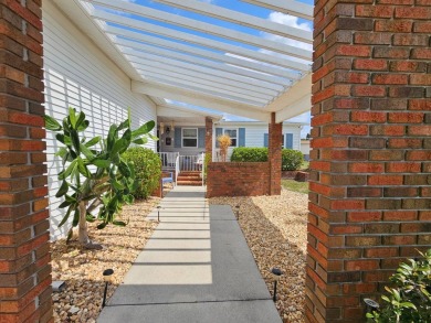 This lovely home is located in North Fort Myers Florida! Pine on Pine Lakes Country Club in Florida - for sale on GolfHomes.com, golf home, golf lot