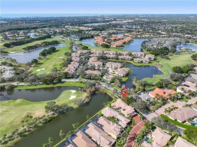 This magnificent two-story courtyard style home features 4BR, 4 on Pelican Marsh Golf Club in Florida - for sale on GolfHomes.com, golf home, golf lot