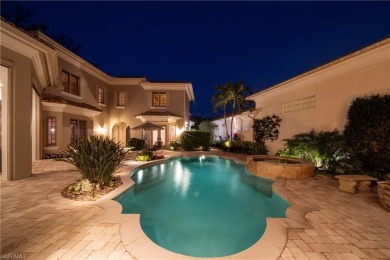 This magnificent two-story courtyard style home features 4BR, 4 on Pelican Marsh Golf Club in Florida - for sale on GolfHomes.com, golf home, golf lot