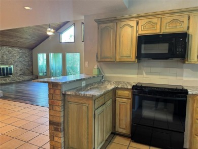 Great curb appeal on this 3BD-3BA Golf Course Home at Holly Lake on Holly Lake Ranch Golf Club in Texas - for sale on GolfHomes.com, golf home, golf lot